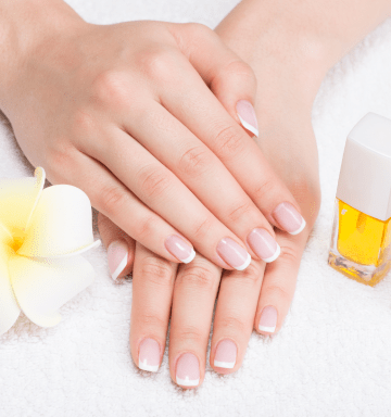 bd811a50-woman-nail-salon-receiving-manicure-by-beautician-beauty-treatment-concept-1-min.png